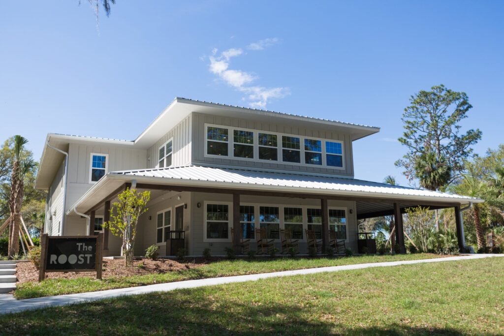 Modern commercial building constructed by Curington Contracting in North Central Florida with covered entry and metal roof.