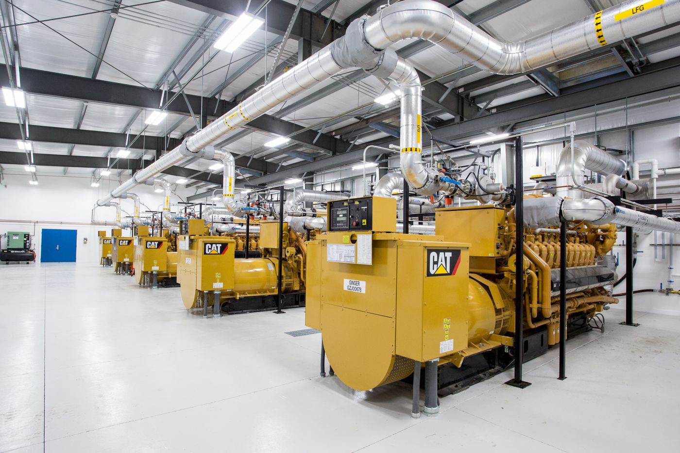 Engine-generator hall with landfill gas (LFG) piping at an LFGTE plant
